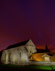 Commanderie of the Knights Templar with red sky. Coulommiers, Seine-et-Marne, France
