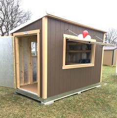 Store 200 Aussie 6x12 PL-2 Bar-Concession Stand with shlelves, window and a shed door turned sideways