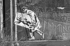 Banksy? Being stolen at Scott Street Bridge! In Monochrome