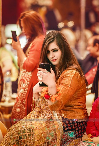 Girls Most Important task at Weddings :D