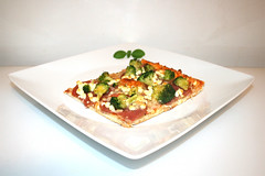 Broccoli salami ham pizza with feta / Broccoli-Salami-Schinken-Pizza mit Feta