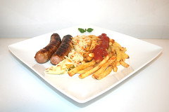 Fried sausage with french fries / Bratwurst mit Pommes Frites