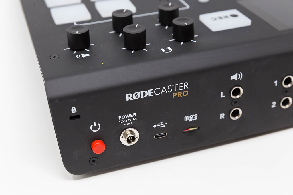 Close-up of RØDECaster Pro podcast studio in front of white background