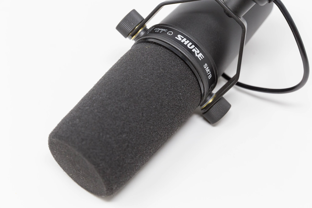 Close-up of Shure SM7B microphone in front of white background