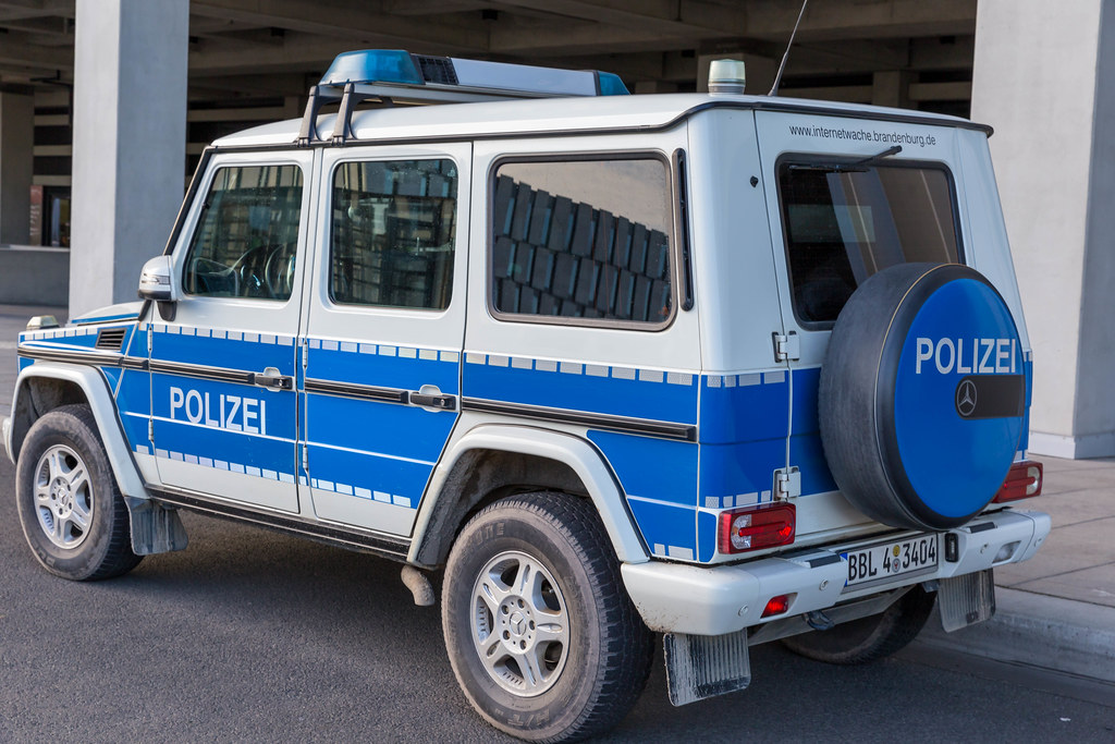 A large police vehicle parked outside Terminal 1 of the newly-inaugurated Berlin airport BER