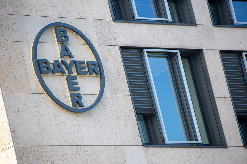 The Bayer logo on the ²BAC building at BER Airport. German pharma and life sciences company