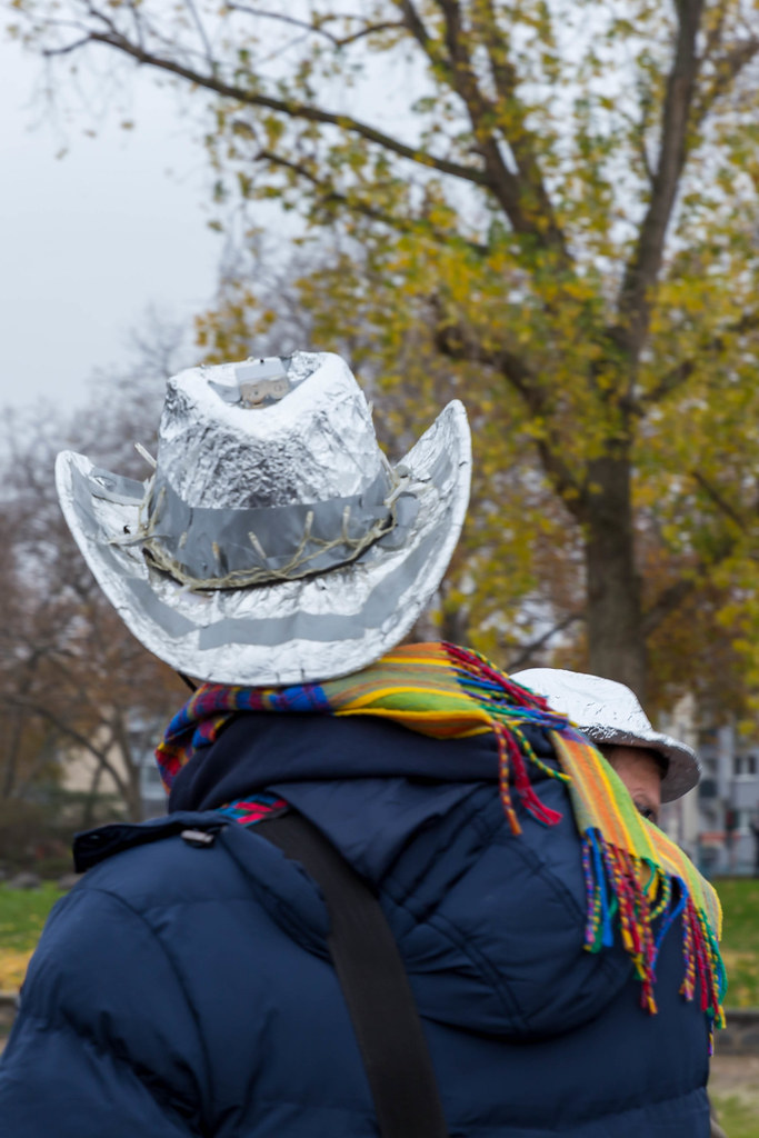 Cologne: man with tinfoil cowboy hat at conspiracy theorists' anti-lockdown meetup during the pandemic