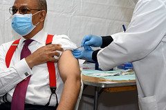 Dr. Rev. Calvin Butts getting his COVID-19 Vaccination at the Abyssinian Baptist Church