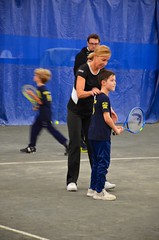 Chris Evert Helping A Boy With His Backhand