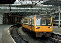 class 142s in Merseyrail PTE livery
