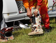 Motocross riders put on their boots. Denmark 2014.
