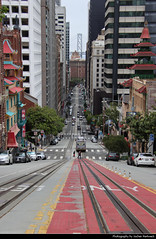 Looking down California Street towards Oakland Bay Bridge, San Francisco, CA, USA