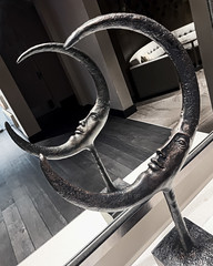 mirrored symmetry crescent moon statue