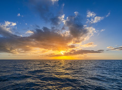 Napali Coast Sailboat Sunset Tour Photography Kauai Hawaii Beautful Setting Sun Orange Clouds Ocean Art Seascape Blue Water Fuji GFX100s! Elliot McGucken Fine Art Hawaiian Islands Landscape Nature Photography! Nā Pali Coast State Wilderness Park