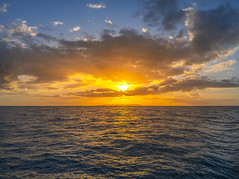 Napali Coast Sailboat Sunset Tour Photography Kauai Hawaii Beautful Setting Sun Orange Clouds Ocean Art Seascape Blue Water Fuji GFX100s! Elliot McGucken Fine Art Hawaiian Islands Landscape Nature Photography! Nā Pali Coast State Wilderness Park
