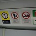 'This way to First class' and 'No feet on seats' signage onboard a Metro Cammel AC EMU
