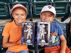 The Kids With Their Mr. Met Bobbleheads