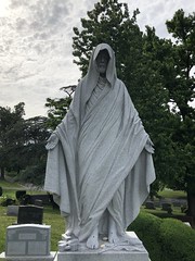 Hooded Jesus statue atop O'Neill gravestone, Rock Creek Cemetery, Washington, D.C.