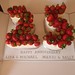 Strawberry topped silver anniversary cake