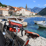 Cycling on the bay front in Perast