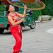 72 years old woman performing in Shichahai, by Houhai Lake, Beijing, China