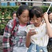 Young  Chinese girls in Shichahai by the Houhai Lake, Beijing, China