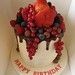 Buttercream chocolate drip cake with fresh fruits