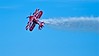 Acrobatic aircraft with smoke trail. This image is provided on an as-is basis, royalty free for personal editorial, blog and web display usage. - Royalty Free Trains, Planes & Automobilies