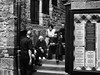 French workers having a smoke break on church steps in Mont Saint Michel. This image is provided on an as-is basis, royalty free for personal editorial, blog and web display usage. - Black and White (Monochrome) Photography