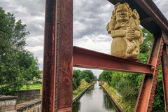 Eifel bridge on the canal with Nepomouck statue