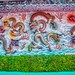 Mural relief of Dragons at Haw Par Villa in Singapore
