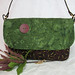 EMMA  Quilted Shoulder Bag   $65  Medium size, deep purple with complementary green batik flp.  Click here for more info.