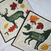 Quilted Trivets (2)  set #2   $30   Autumn Wilderness Animals.  10.5" square.  Click here for more info