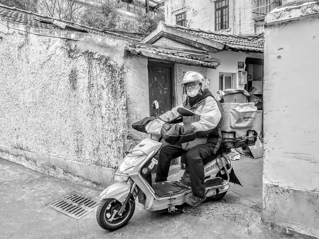 A food delivery driver traversing the most secluded corners of the city