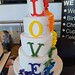 Pride rainbow themed wedding cake