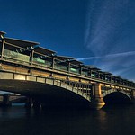 Sunrise Reflections in Blackfriars Station Bridge by Henry Brzeski