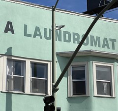 A Laundromat sign, Piedmont Ave, Oakland