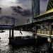 Early evening view of the Chao Phraya river, pier and adjacent tall buildings, Bangkok, Thailand.  788a