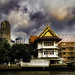 Some older architecture mixed with new construction along the Chao Phraya river, Bangkok, Thailand.  796-Edita