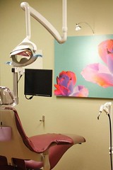 Art work in front of dental chair at San Antonio dentist New Heights Dental & Braces