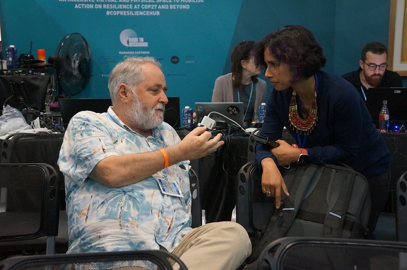 John Benzie and an audience member at the 27th United Nations Climate Change Conference (COP27). Photo by Aniss Khalid, WorldFish.