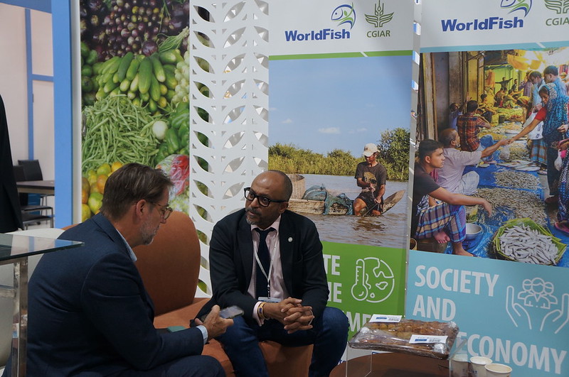 WorldFish&#039;s Essam Yassin Mohammed and Environmental Defense Fund&#039;s Gerald Miles at the 27th United Nations Climate Change Conference (COP27). Photo by Aniss Khalid, WorldFish.