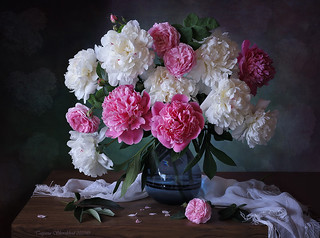 Still life with a bouquet of peonies and roses