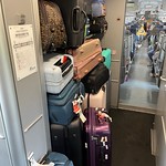 Luggage piled up in the EuroCity Milano-Frankfurt