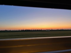 Golden hour from a train window, north of Orléans - Photo of Mérouville