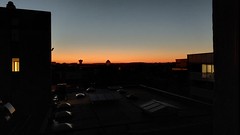 Zonsondergang vanuit hotelkamer