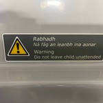 Do not leave child unattended sign - in Irish Rail train