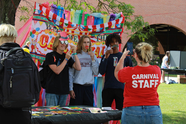 Students participate in the Career Carnival photo booth.