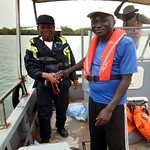 Aboubacar Sané, local focal point of the project (CNHSB) and Mr. Toupou Dalema, Chef de base du CNSP de Kamsar after measuring water depth