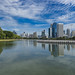 Benjakitti lake and park with skyline in Bangkok, Thailand